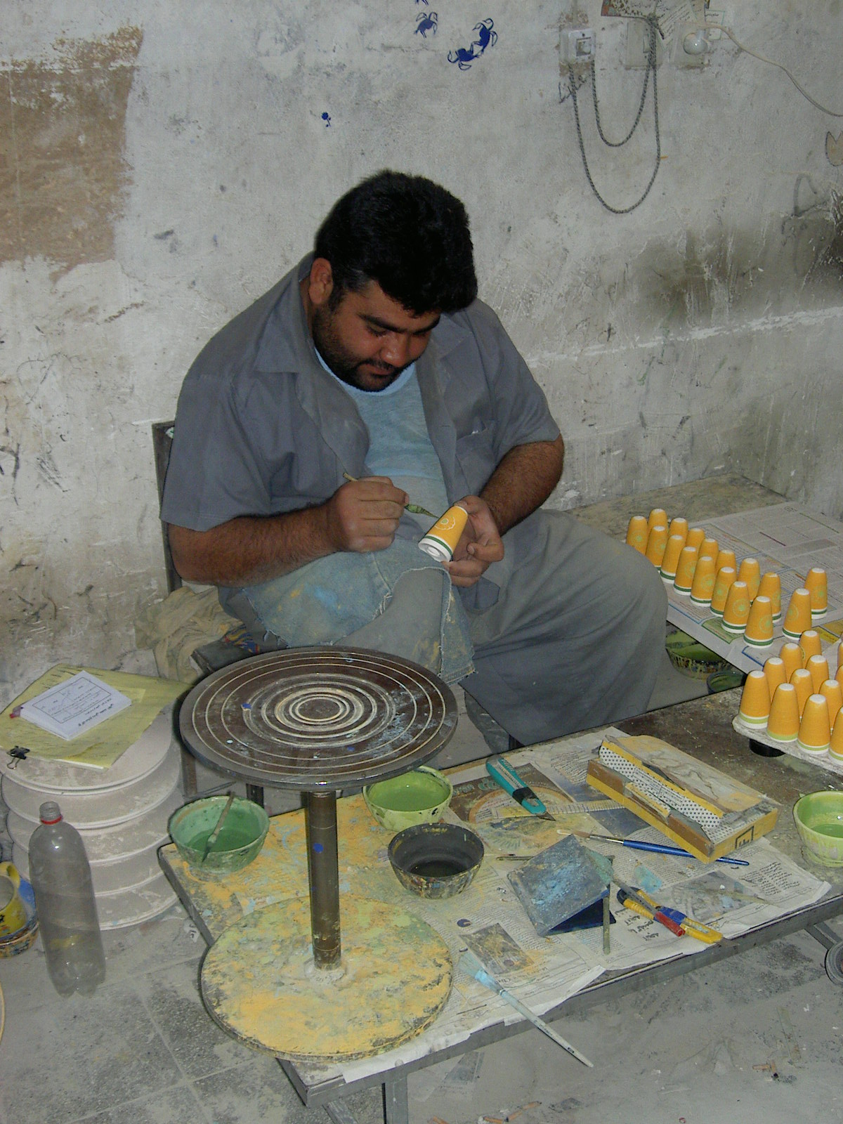 Meybod - Man making ceramic dishes