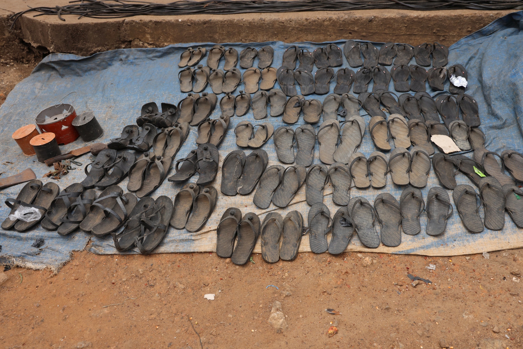 Uganda - Fort Portal - Market - Flip-flops from recycled tires